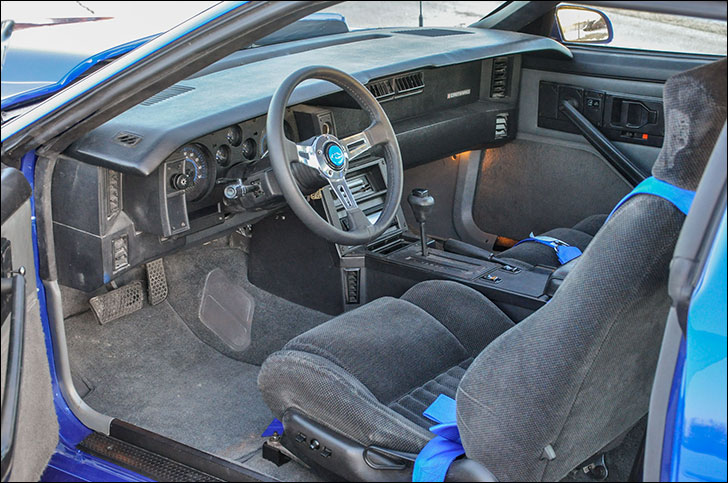 Six Degrees 1958 Camaro: Paint, upholstery, and black accents